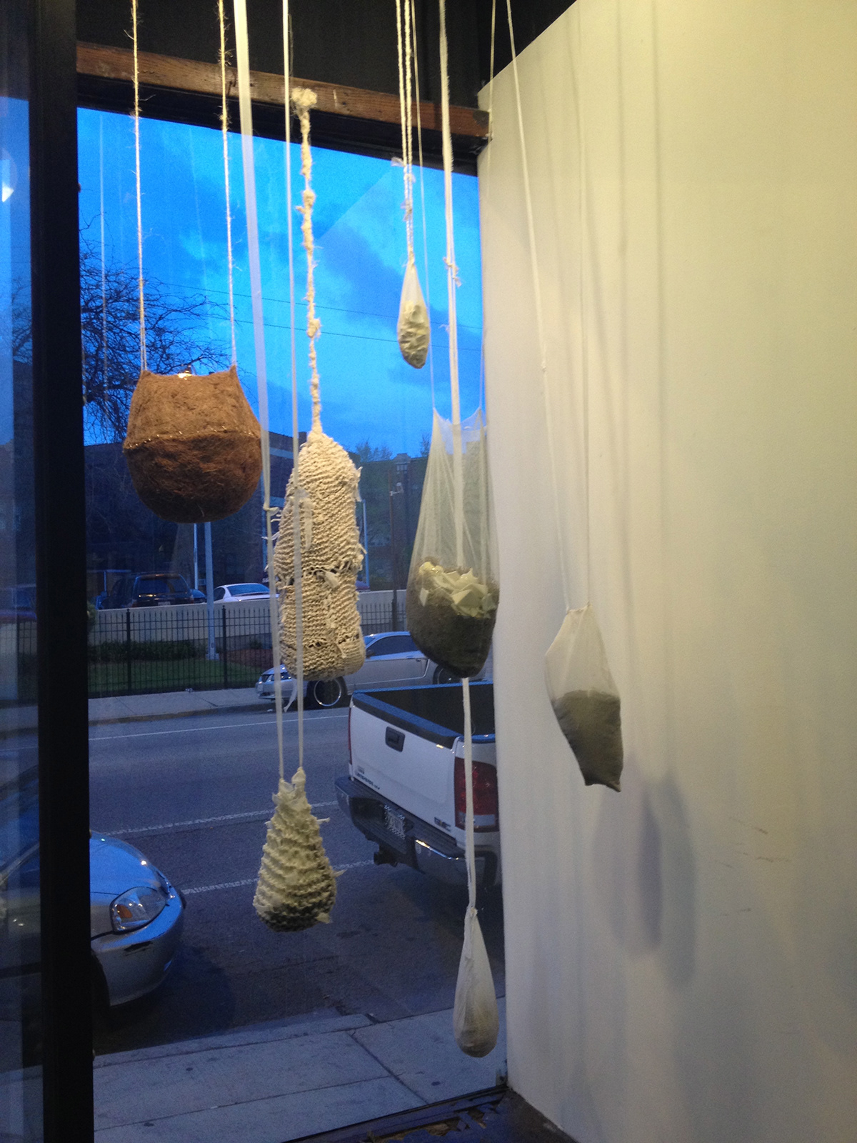 Cocoon nest knit dirt sculpture soil broke fixed mixed media hanging installation transforming tranquil