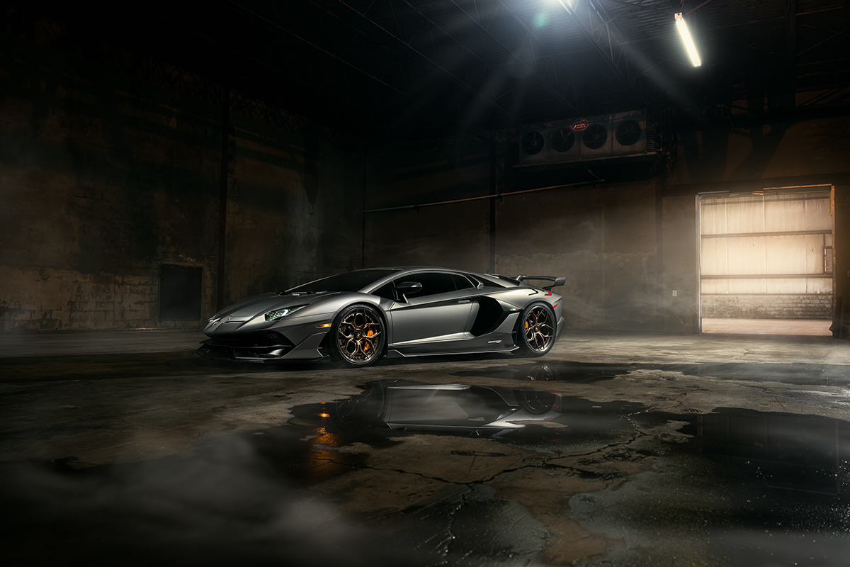 Lamborghini Aventador with HRE wheels in an abandoned warehouse.