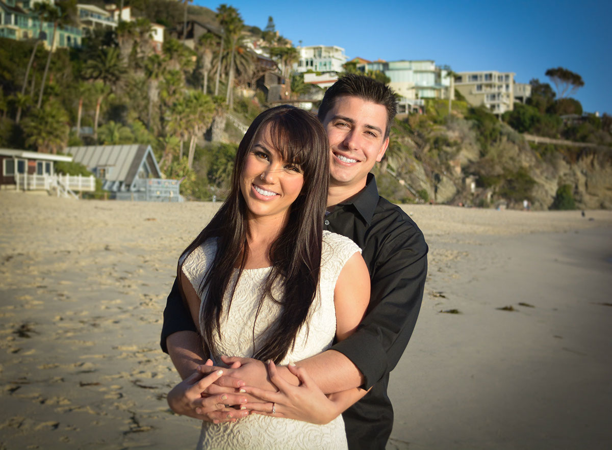 engagement photoshoot Love couple Laguna Beach orange county California Ocean sunset Beautiful wedding rings scenery beach