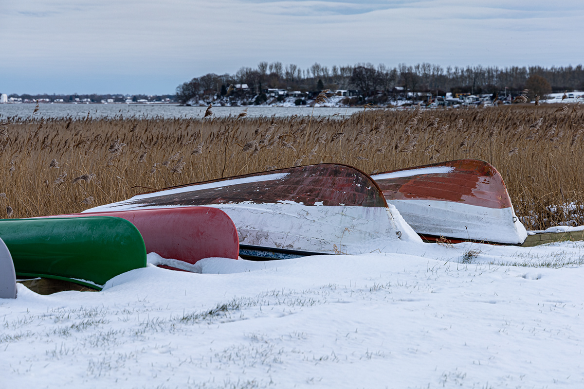 bay boat canoe cold frozen ice pier reed snow water