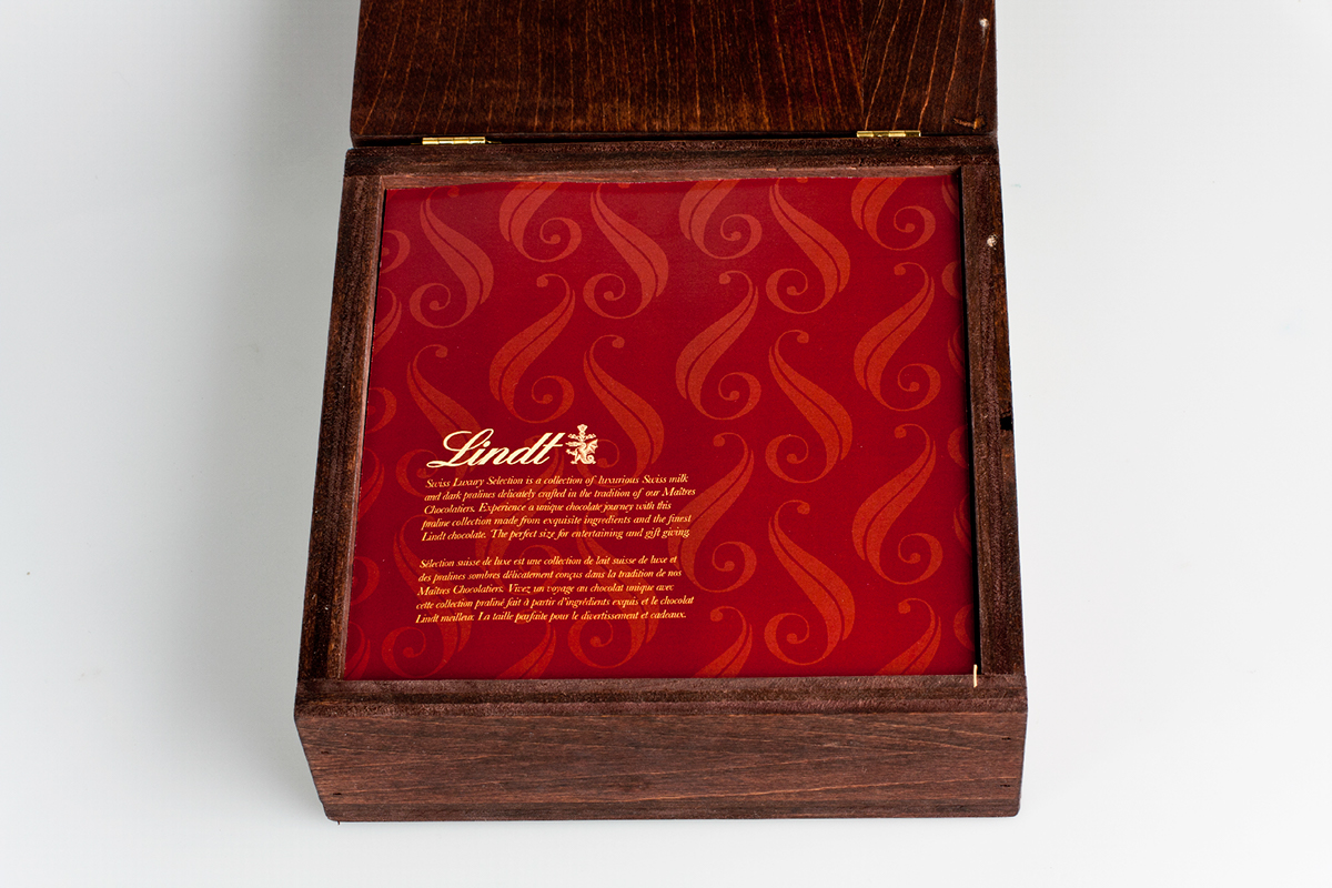 Lindt packagingholiday wooden box red design graphic chocolates package set layers