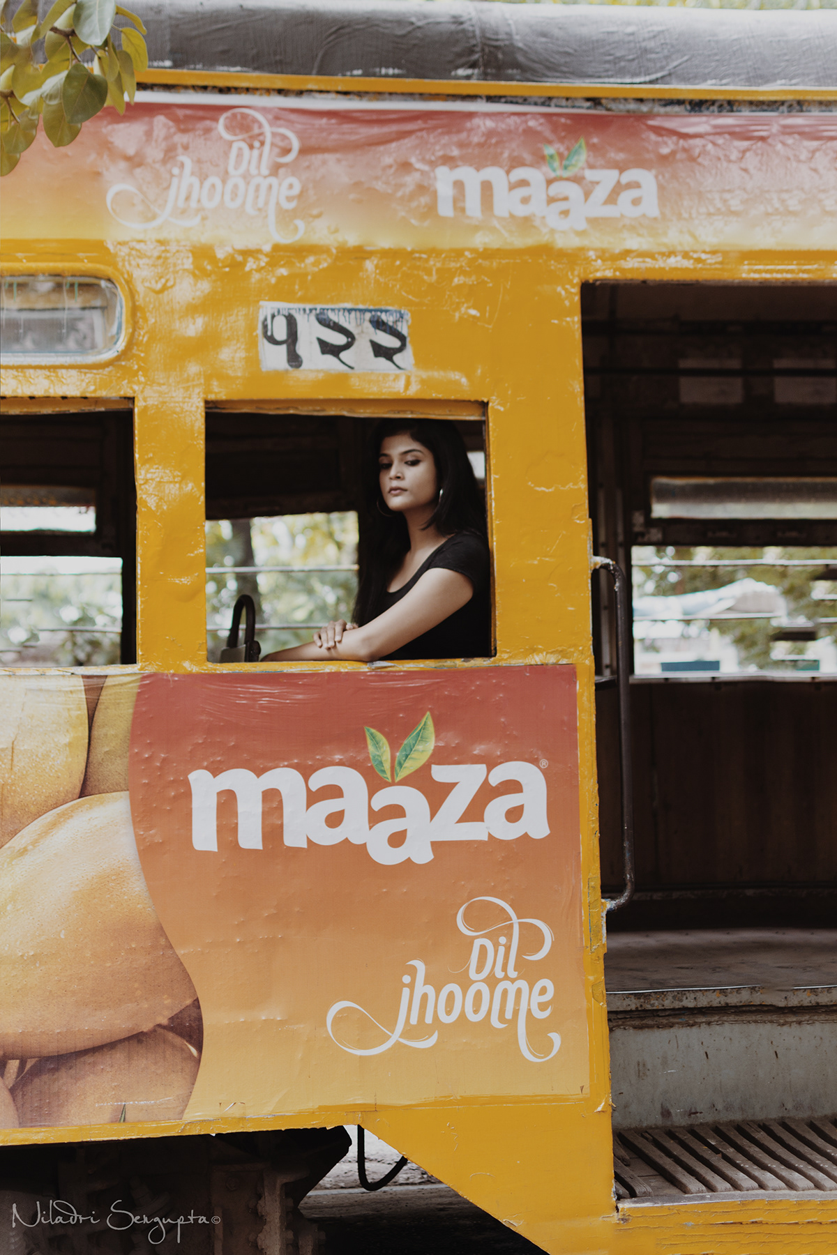 Outdoor Kolkata tram bold girl old new