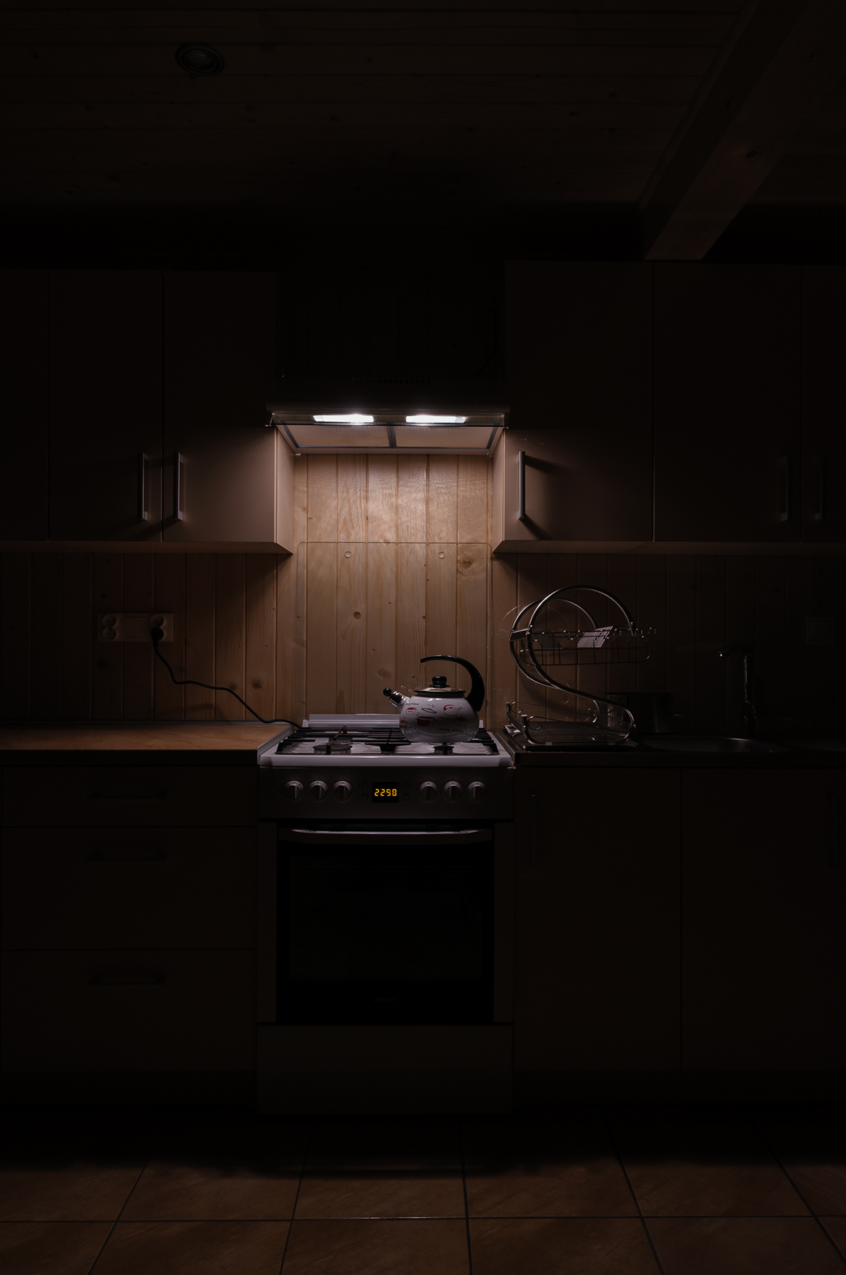 color copy space dark Iluminated Interior Indoors kitchen light device no people night oven rack stove wood pablo charnas