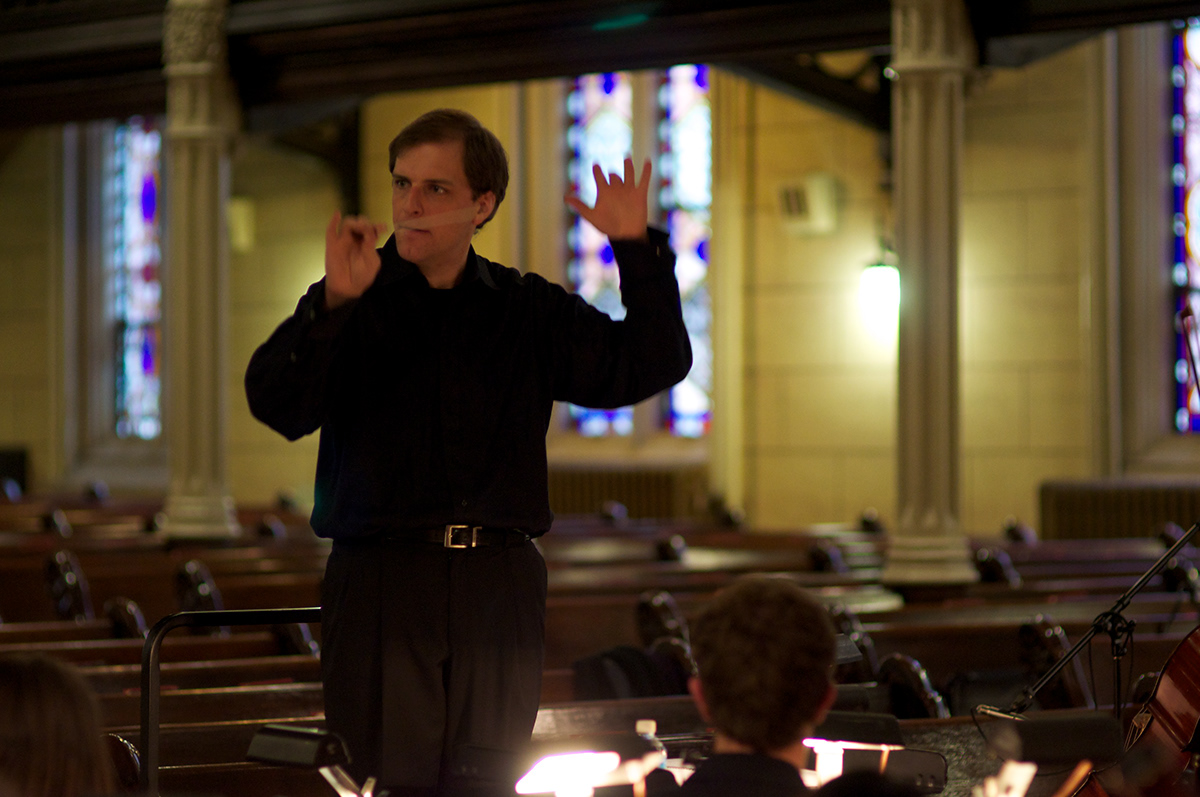 conductor conducting Conducts jordan Randall smith artistic director musician Classical contemporary