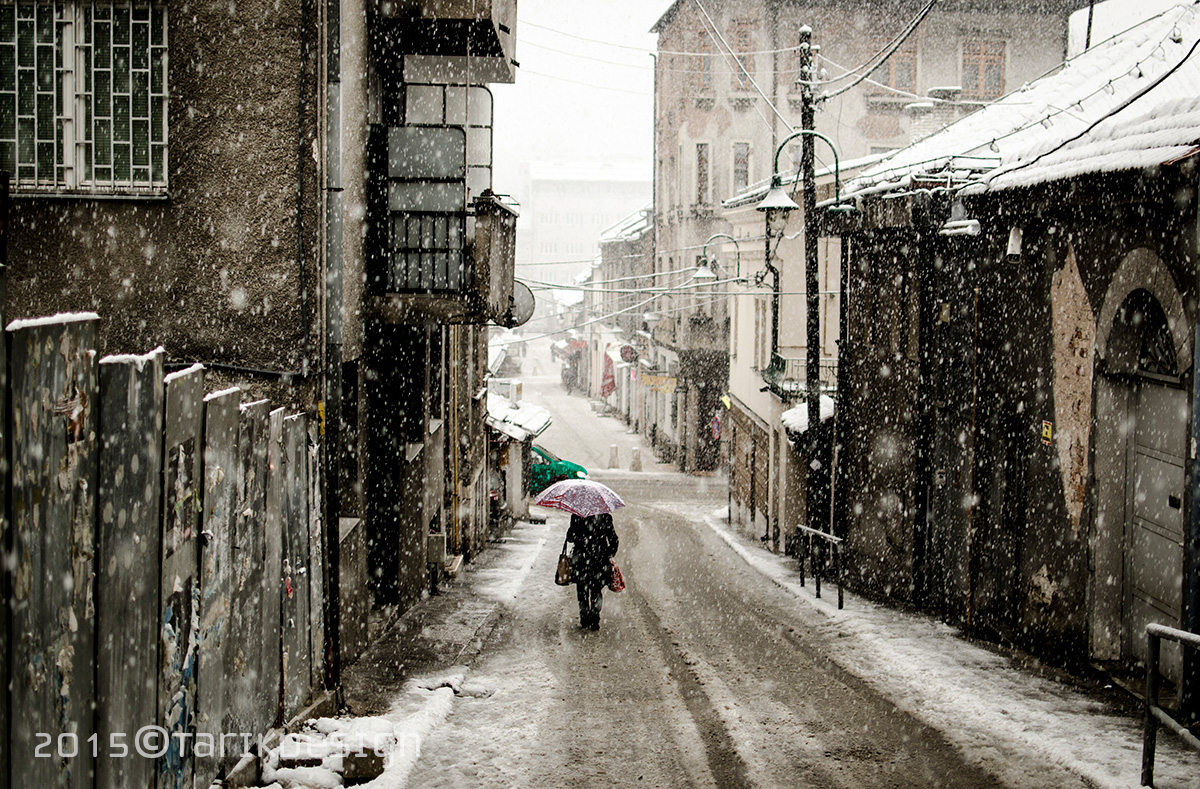 photo series Sarajevo city street photography snowflakes Urban life Europe bridge snow Umbrella walker town hometown homecity