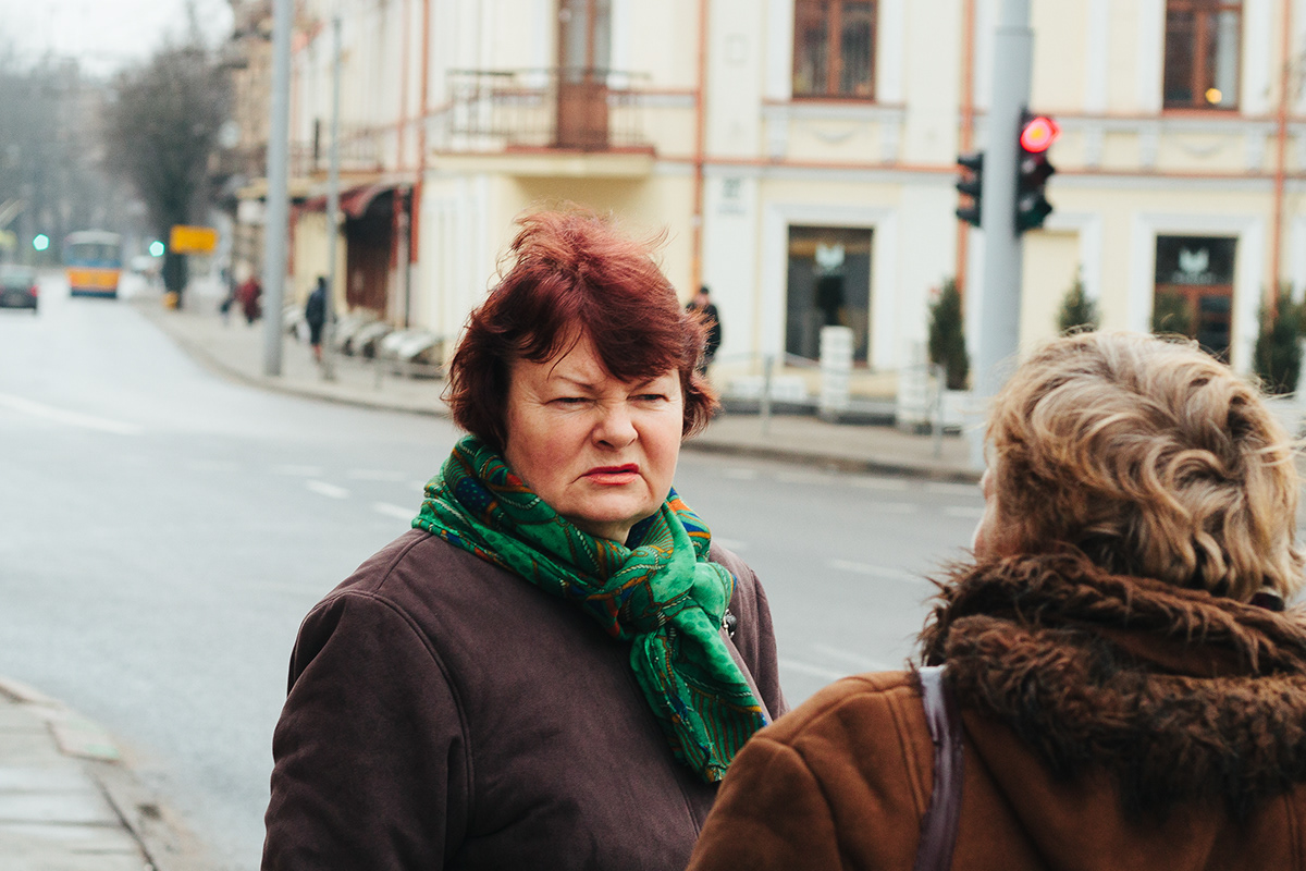 old city people portrait vilnius lithuania Street walking waiting talking smiling getting old