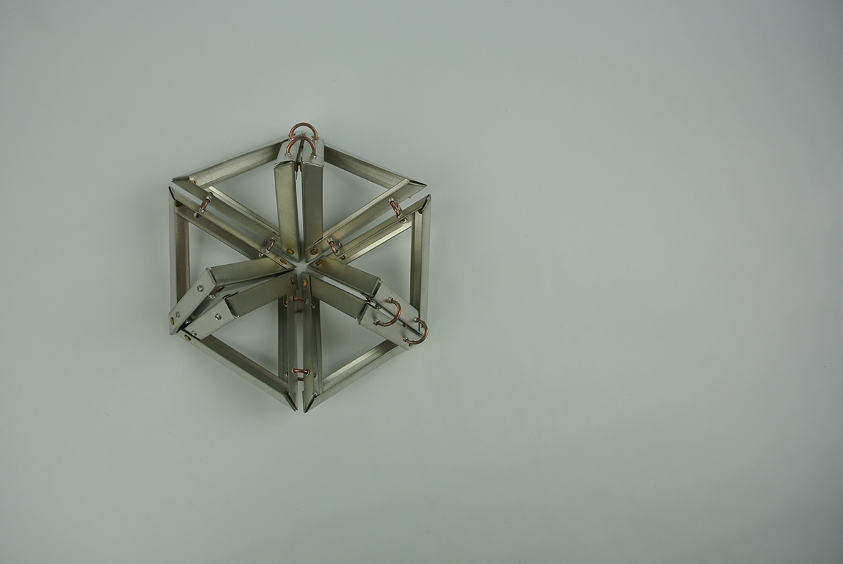 aluminum shape grammar brass rings rivets metals kinetic interactive
