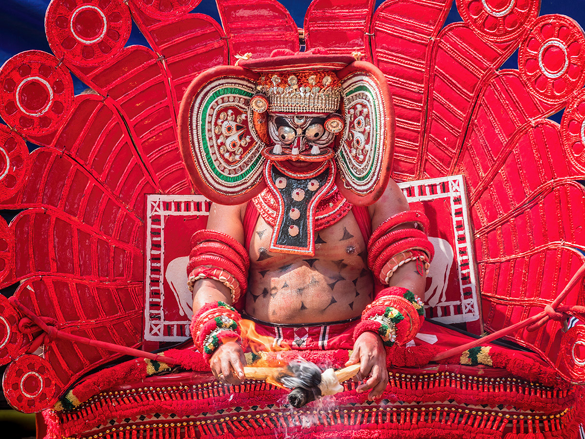 costumes dance form India kerala painted masks ritual art form theyyam Travel Photograohy
