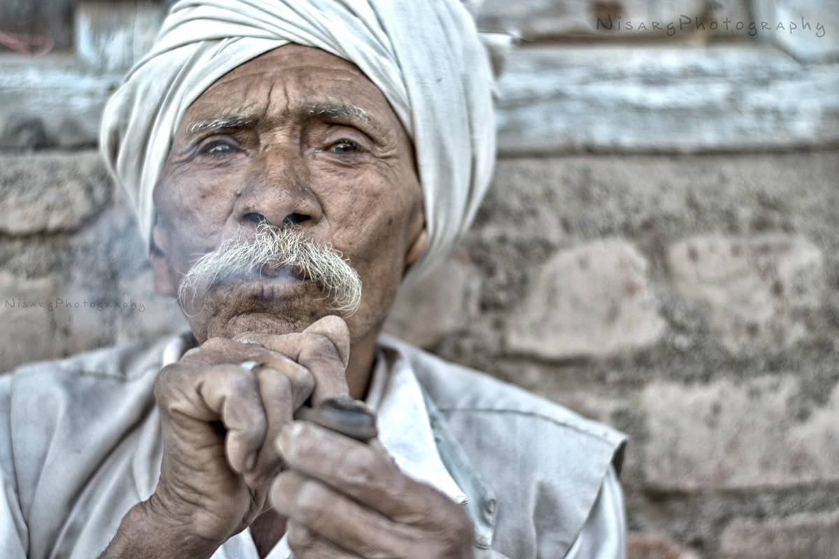 smokes portraits oldpeople indianpeople khasvillage ahmedabadphotographer torontophotographer portrait portraitsofindia nisargphotography people indianman indianmanportraits faces