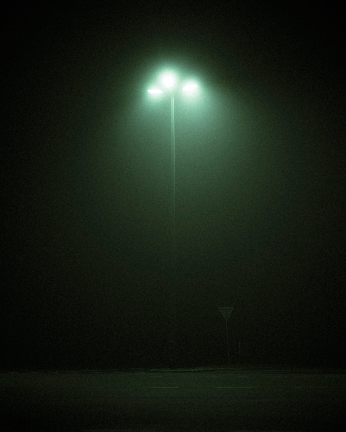 lost deserted desolate fog mist streets buildings light dark Cinema movie mood eerie abandoned