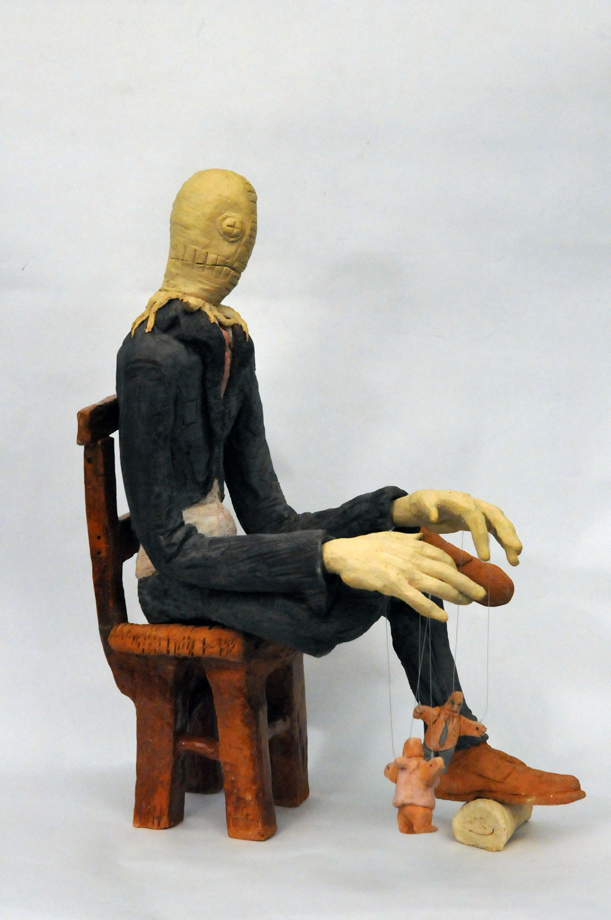 ceramic puppet scarecrow