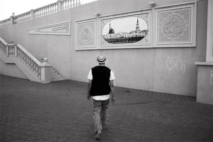 yufo sharjah dubai UAE person human male walk walking composition qasba individual black White monochrome Still shadow alone dark darkness