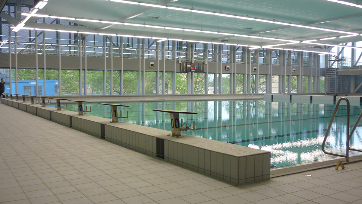 zwembad waterpolo multifunctioneel appartementen parkeergarage openbaar commerciële ruimten beweegbare bodem hefwand