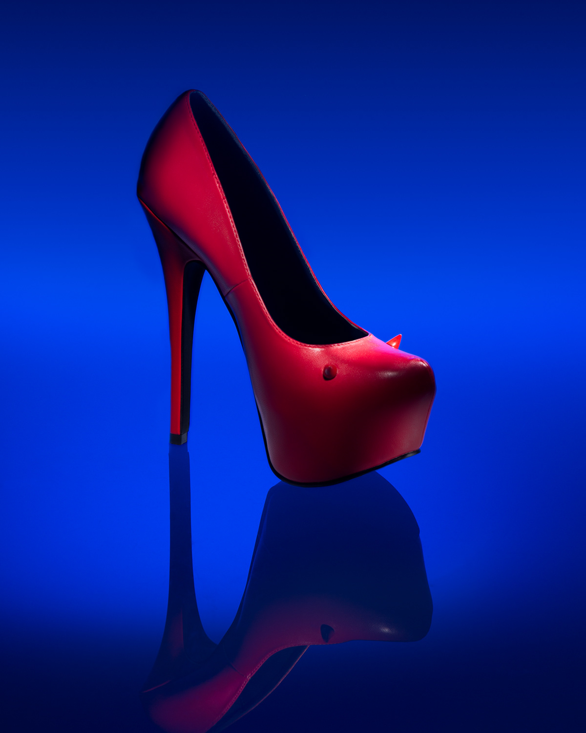 shoe devil devil shoe red shoe color color photography fashion photography product still life studio utah photographer