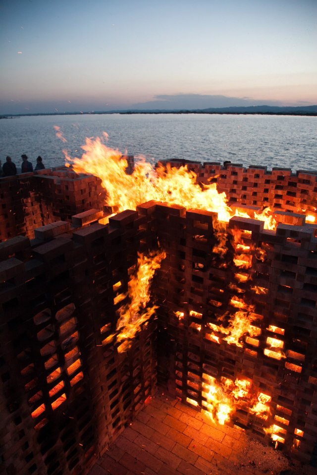 sculpture installation fire burning brick temporary festival