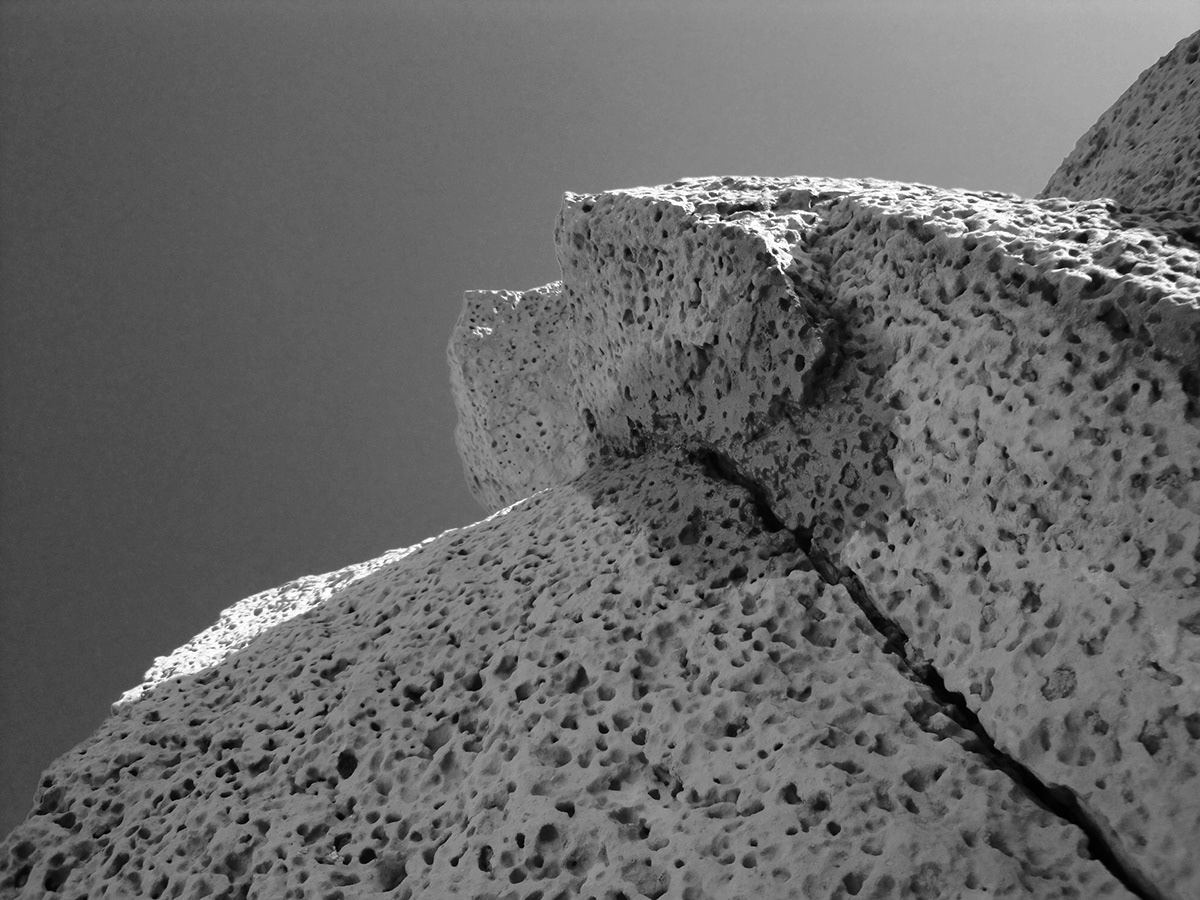 black snow black and white and rocks rock Nature winter