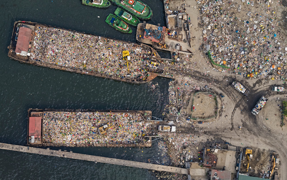 Manila philippines Aerial overpopulation ships harbour fishing fisherboat meagcity polution