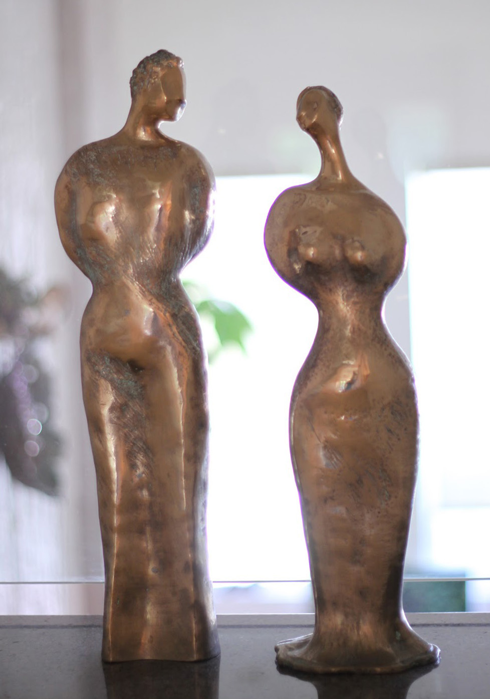 Bronze glaze man woman man and woman
