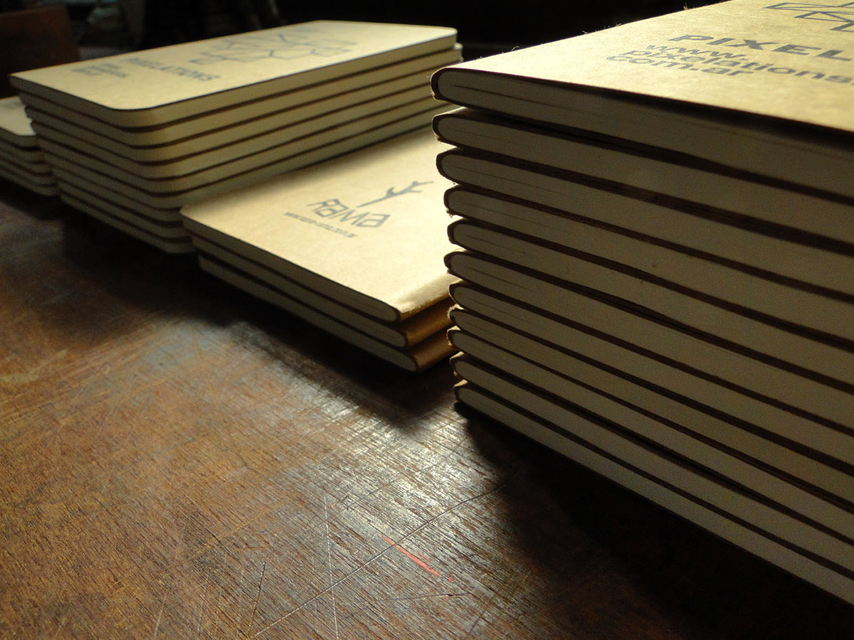 Bookbinding  notebooks   pixelations  pocket books  letterpress  printing book  cardboard print  rama estudio  rama  encuadernacion  Pasaporte  libretas merchandising  regalos empresariales