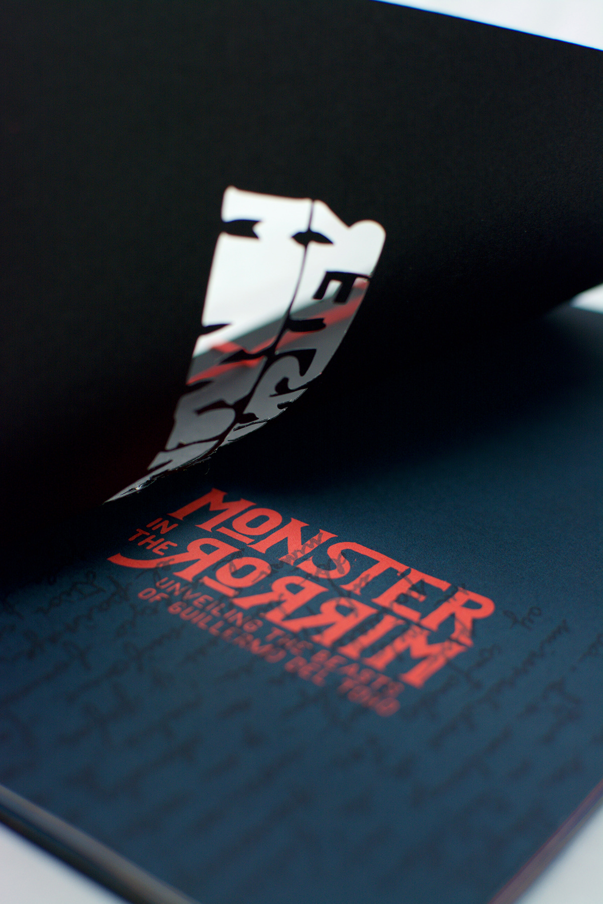 branding  film festival guillermo del toro design print design  Packaging laser cuts Japanese Stab Binding binding