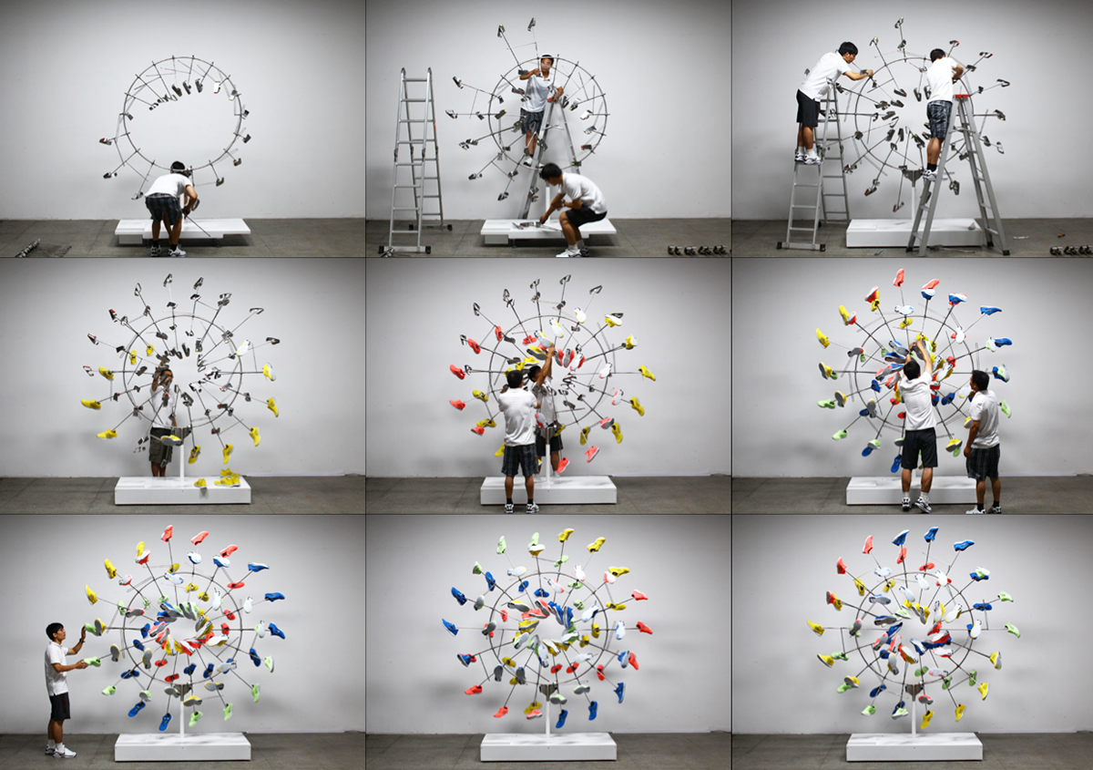 Nike free shoe installation sculpture kinetic rotate Window rainbow colorful motion