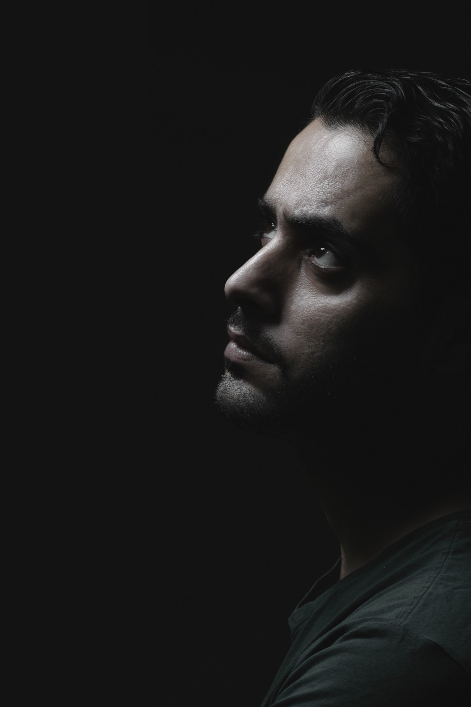 dark studio photo spot light man face iraq BAGHDAD sad black model mikkhalaf