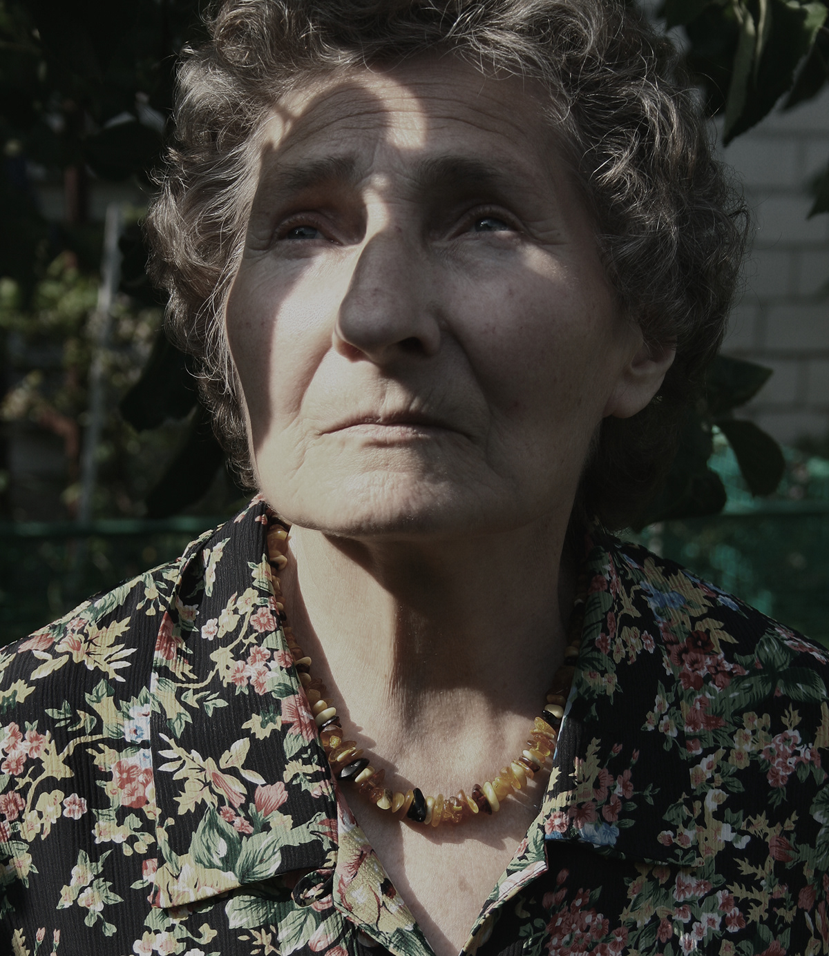 Sun woman Elderly eyes peace diginified reflection