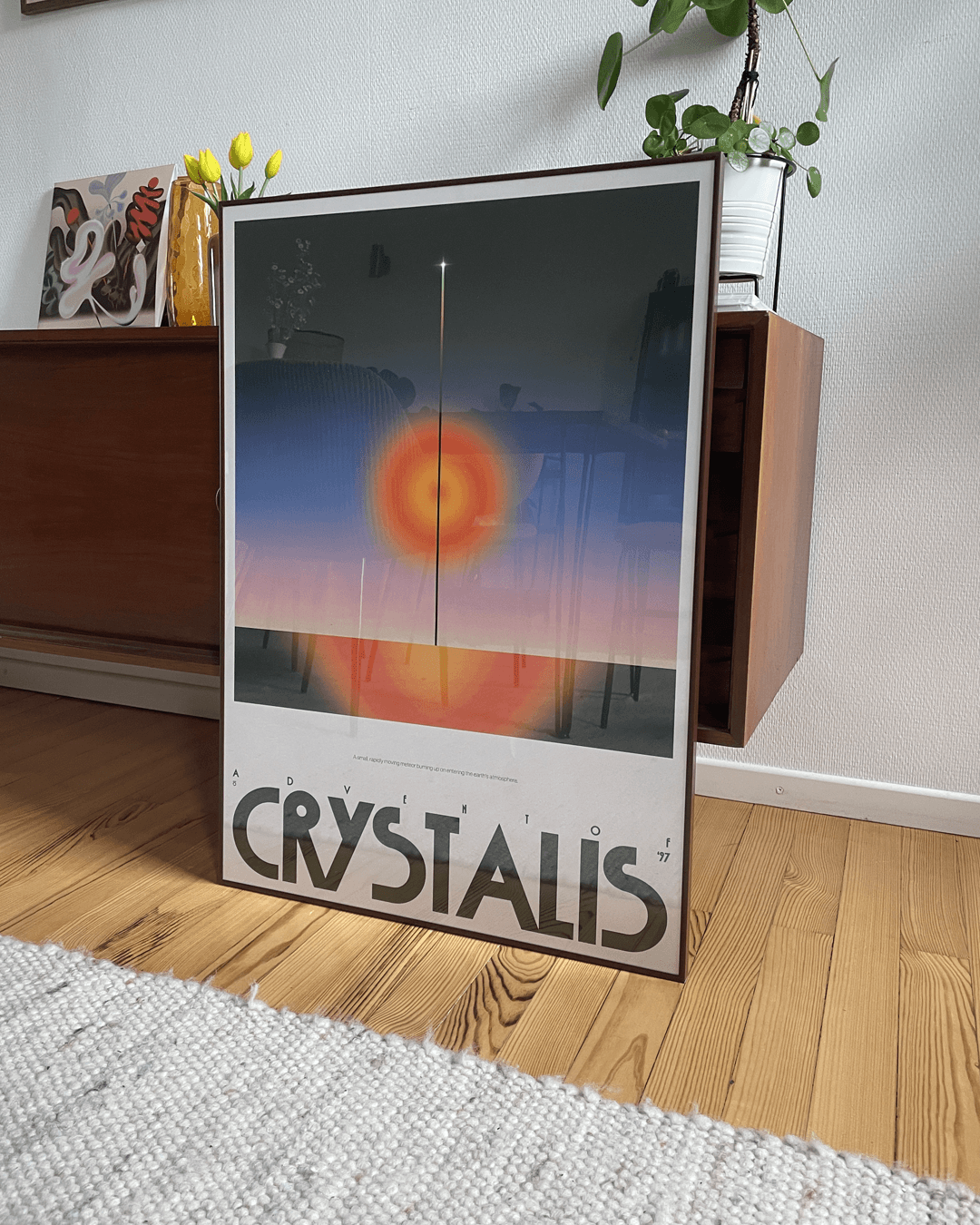 A framed poster of crystalis with the a centered meteor