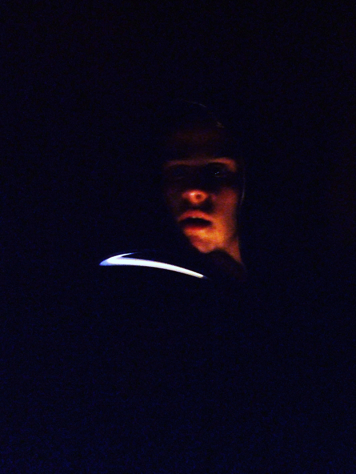 hidden identity darkness dark black light glow warmth question figure portrait stereotype experimental photography experimental concept