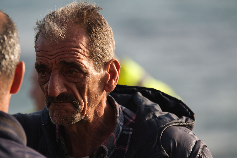 Humanitarian photojournalism  refugee Aid charity Greece Syria portrait candid Street