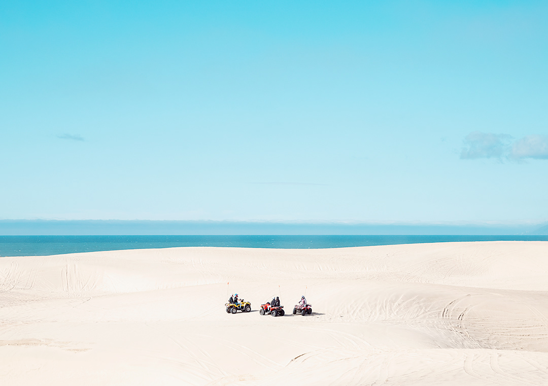 ATV beach California dune extreme four wheeler minimalist Ocean Pismo sand