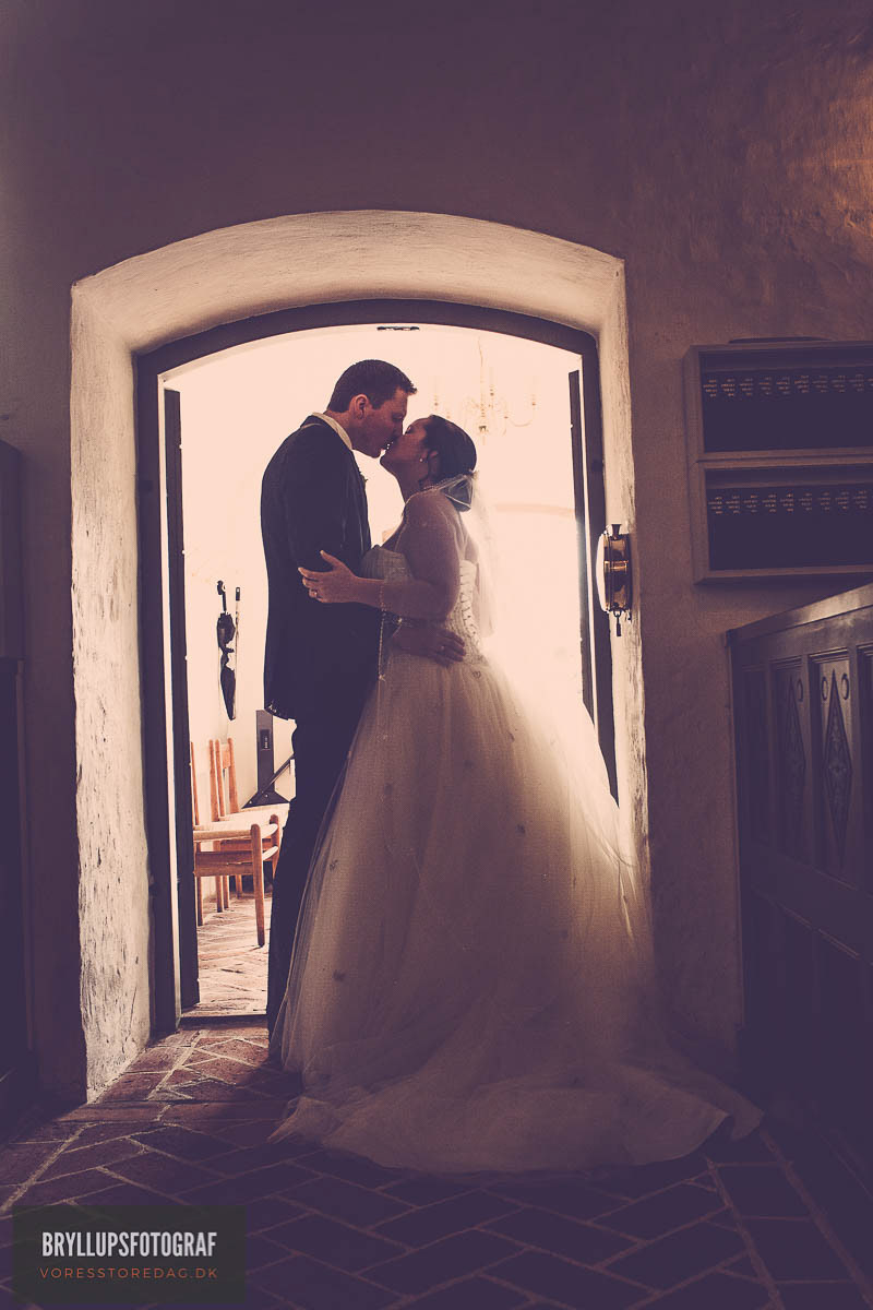 Image may contain: wedding dress, kiss and bride