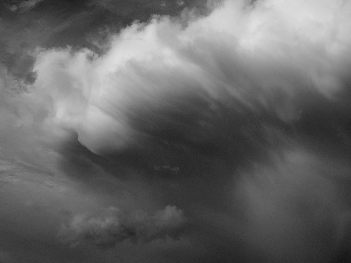 clouds storm plane