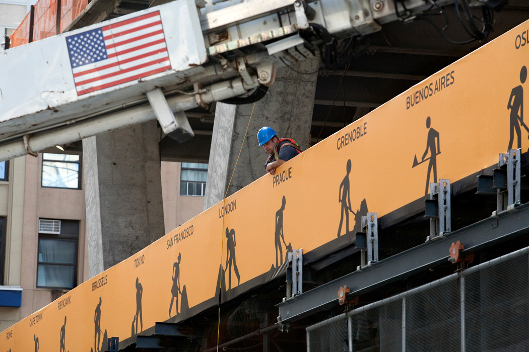 men at work installation public art sign new york city nyc
