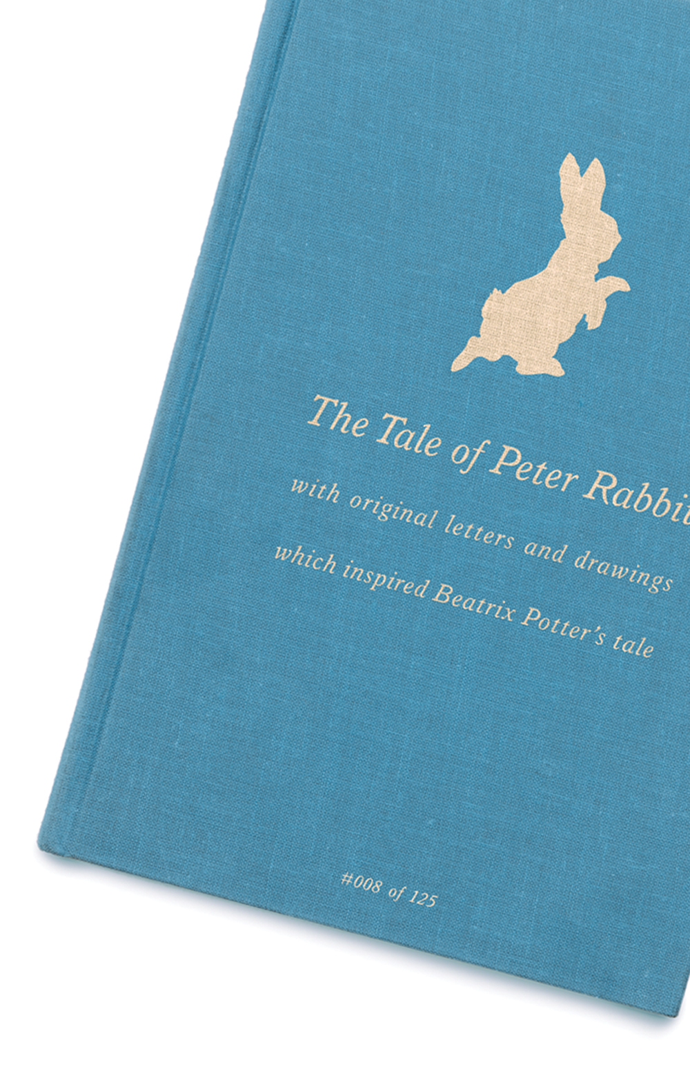 Peter Rabbit book design new look buttons blue