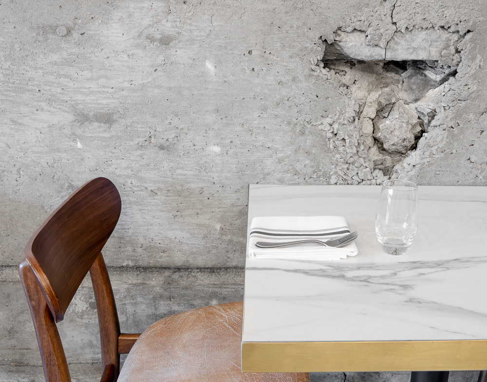 restaurant table kitchen dining room brick wall Concrete Wall TAP dishes cutlery Kitchen island