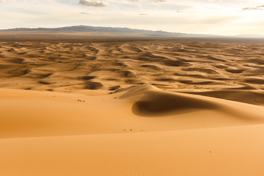 Gobi Desert sand dunes mongolia sunset mountain yellow nomads