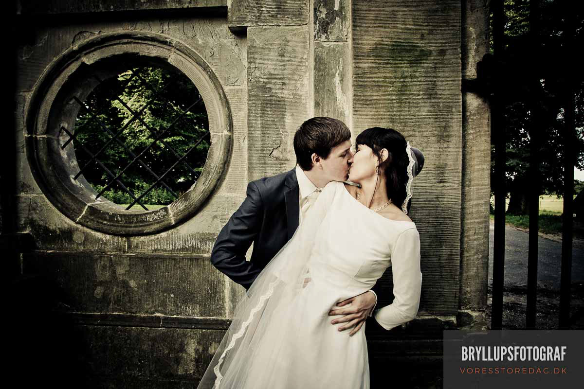 Image may contain: kiss, wedding dress and bride