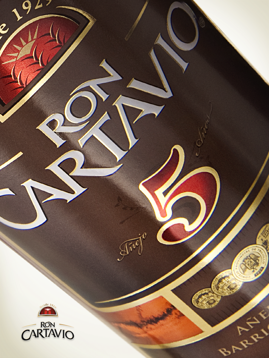 ron cartavio bottle design rebranding labels gold foil piero salardi logotype redesign packaging design