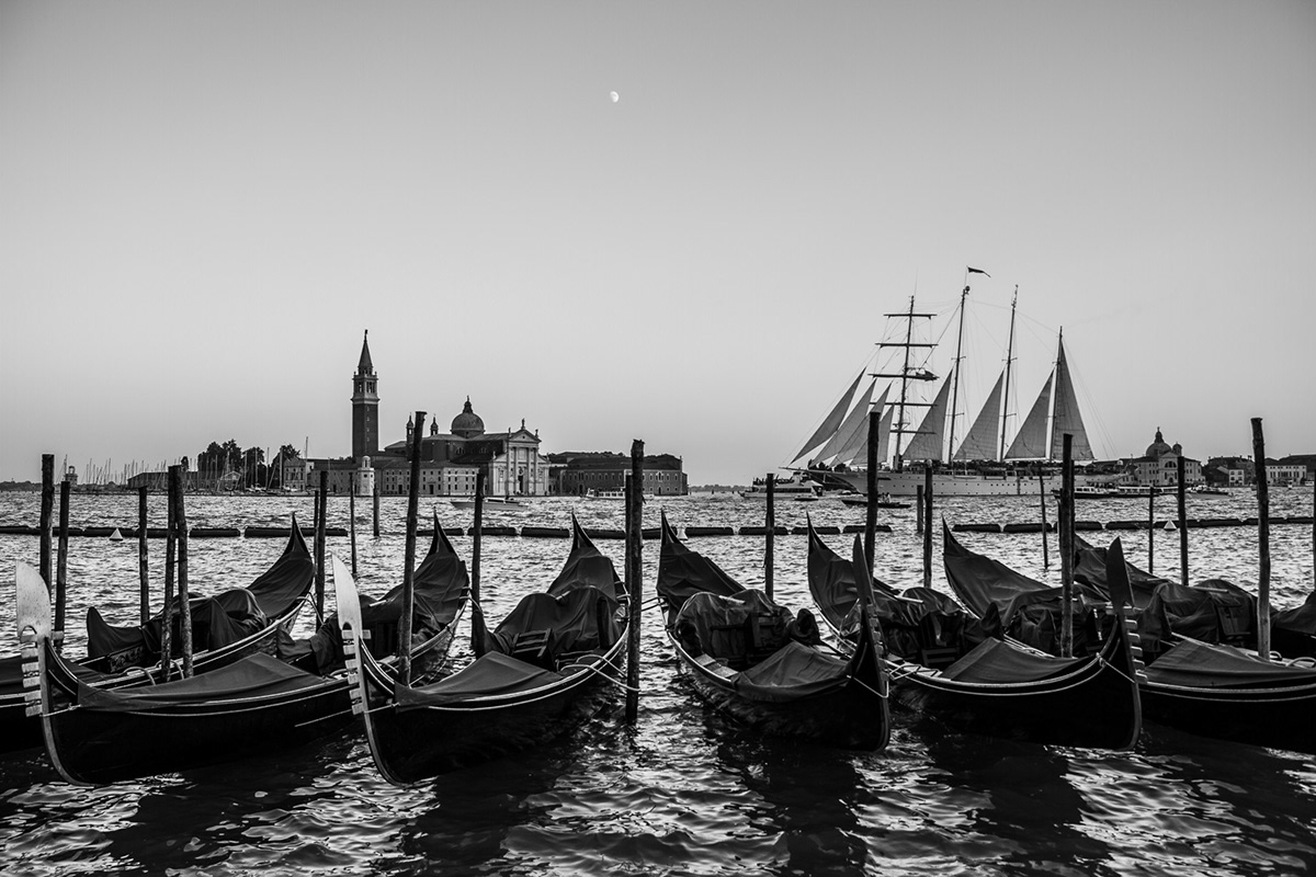 Italy Venice bag gondola gondola ride b&w water church pigeon art city photo