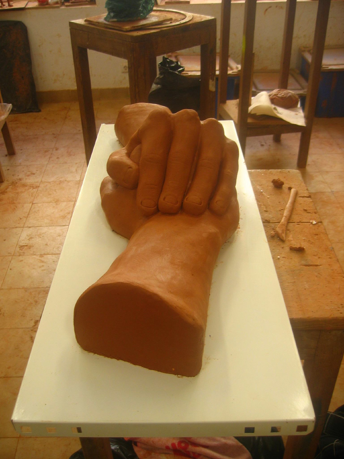 hands clay augmentation scale arms