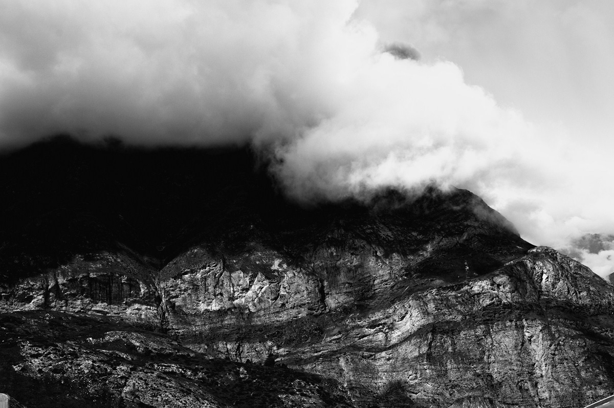 mountain breach clouds
