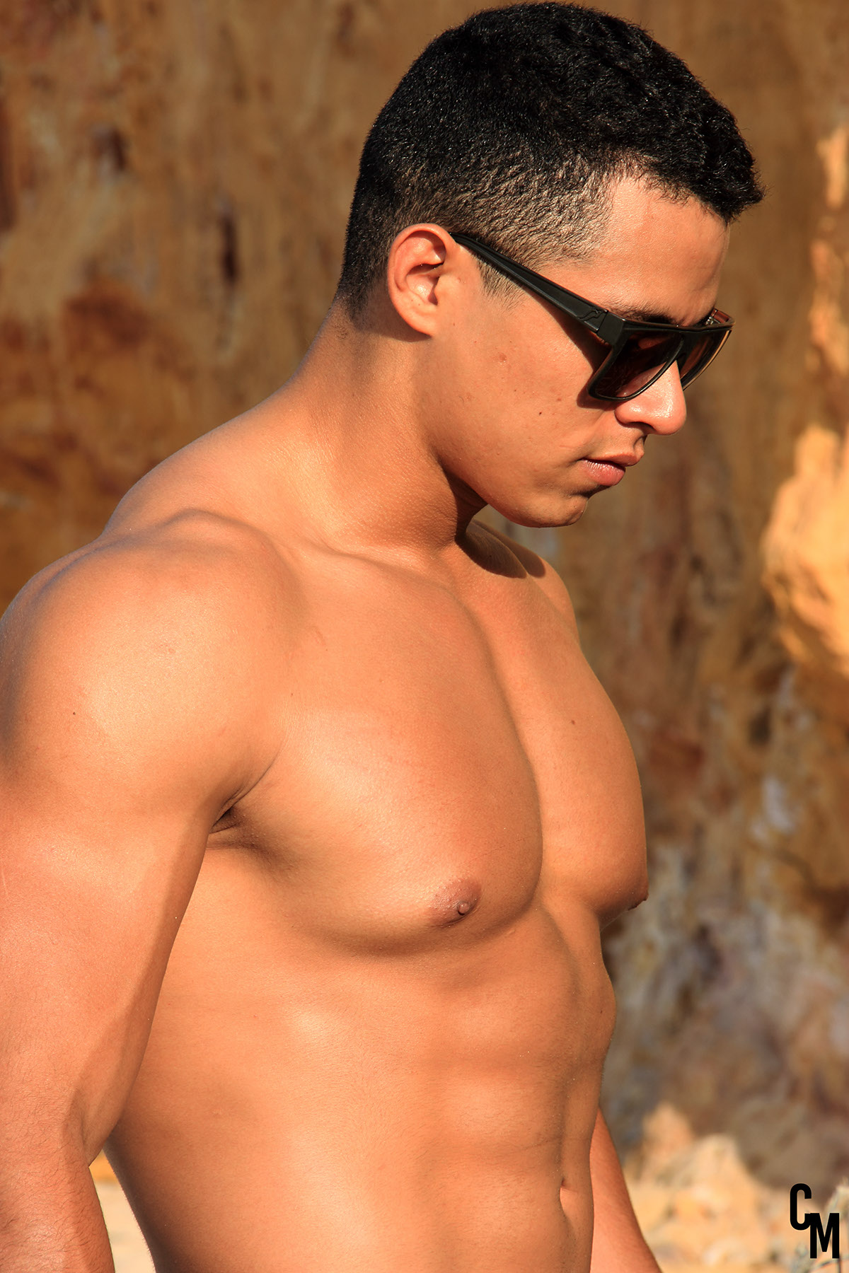 man beach stone yellow FIT muscle storng handsome Latin Sun