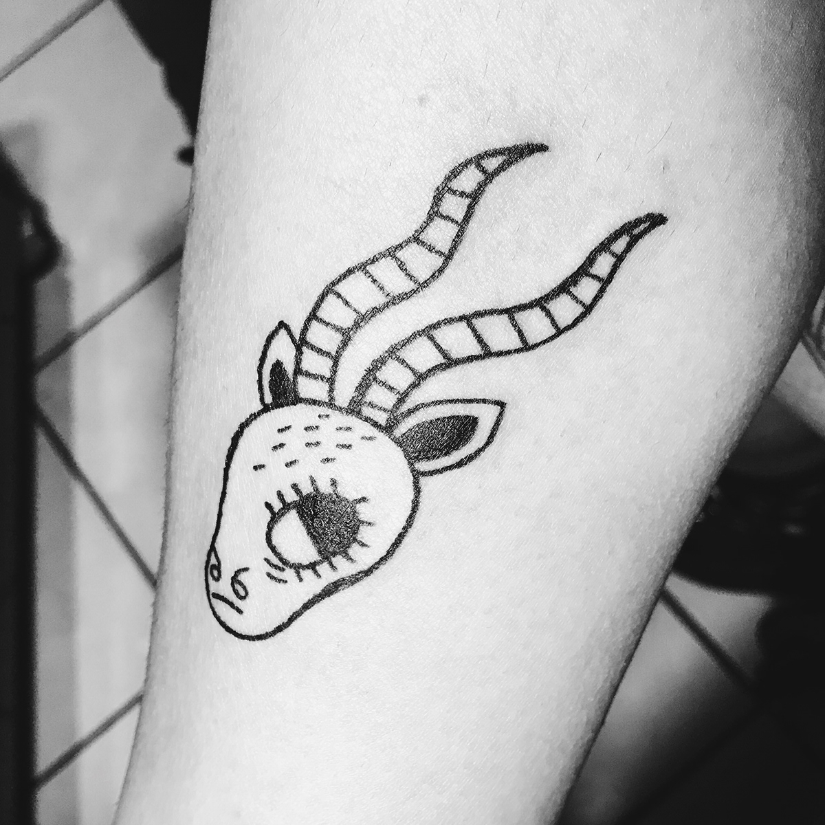 tattoo ink linework zodiac mercury capricorn skull goat
