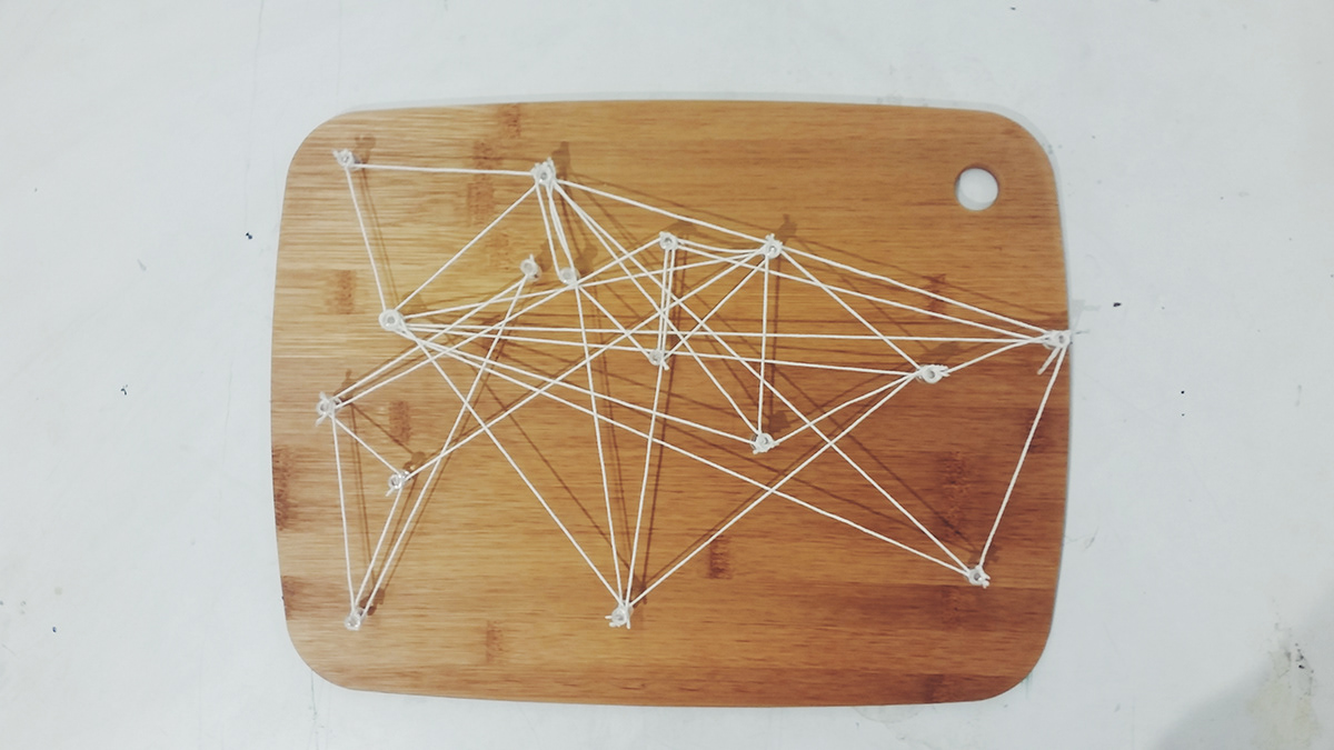 strings world wars  abstract representation wood cutting board tacks tension lines string installation 3D
