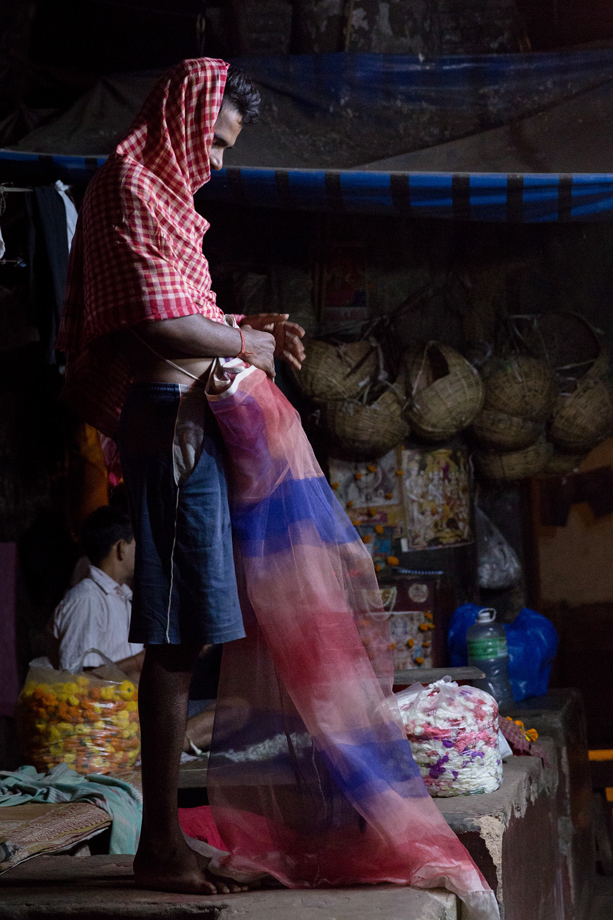 Kolkata India Mullik Ghta Flower Market nighttime Documentary  ambient light low light sleeping