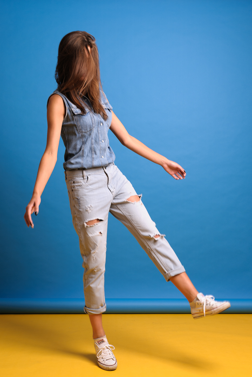 blue yellow jeans jump fashion photography model