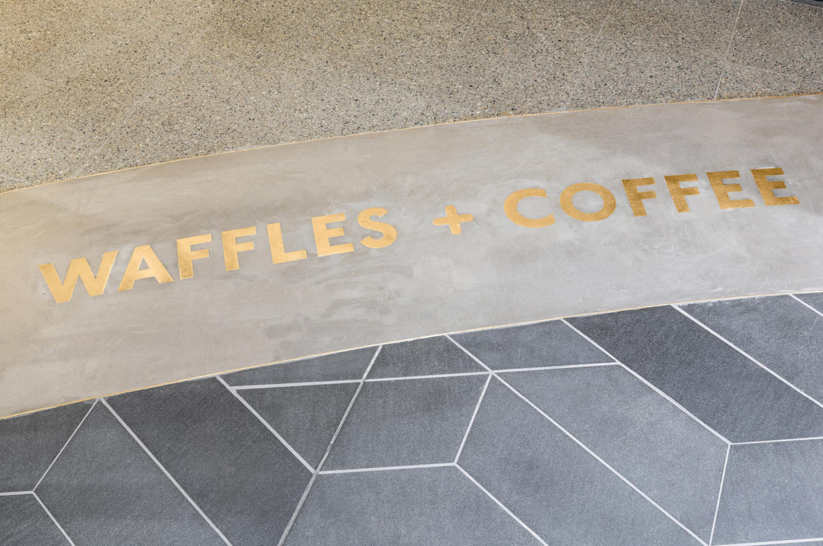 Waffles Coffee custom typography Bespoke Typography marque racoon Custom Illustration Signage brass coffee cup carry bag apron concrete vinyl Website