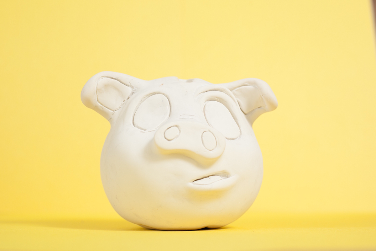 golden piggy sculpey sculpture toy toy vinyl piggy piggy bank