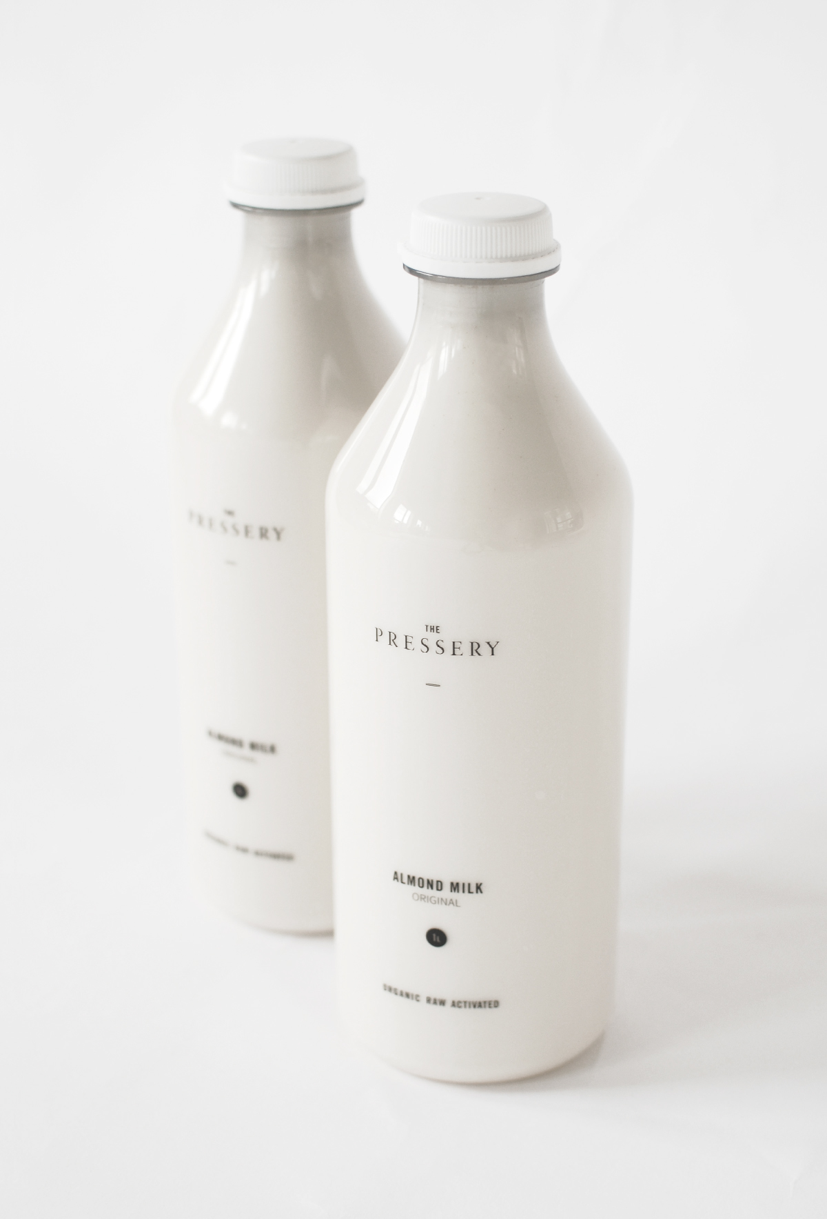 Pressery almond milk corporate identity fonts artisan bottles organic produce luxury Quality logo Layout design